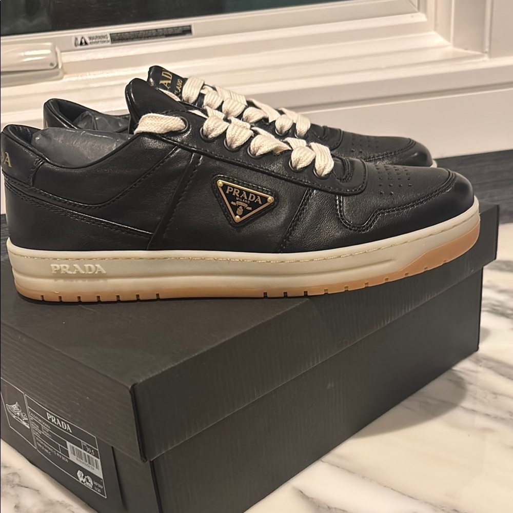 Prada women Black Leather Sneakers with Cream Laces and Gum Sole